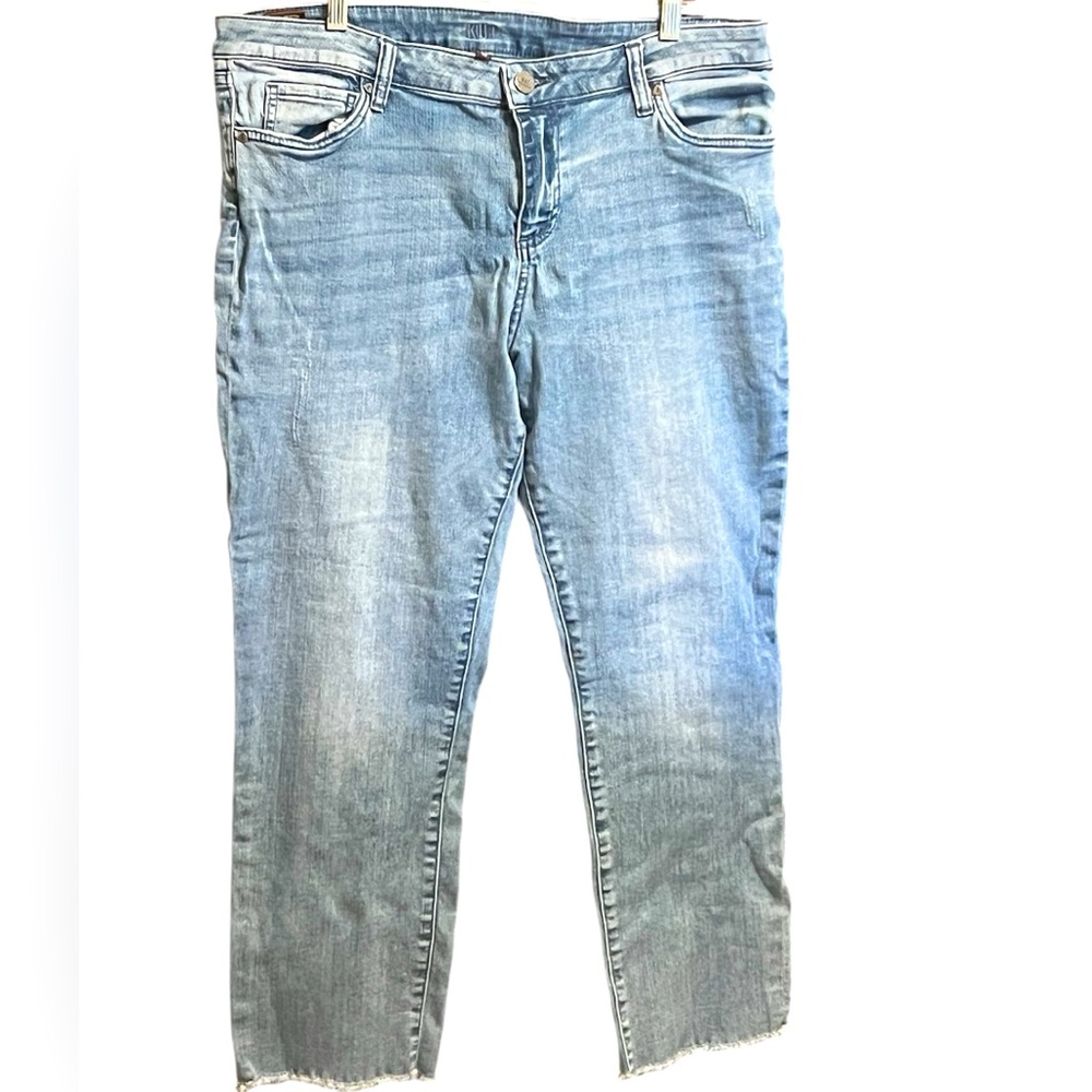Kut from the Kloth brand crop jeans. Cut/fringe edge on the bottoms.